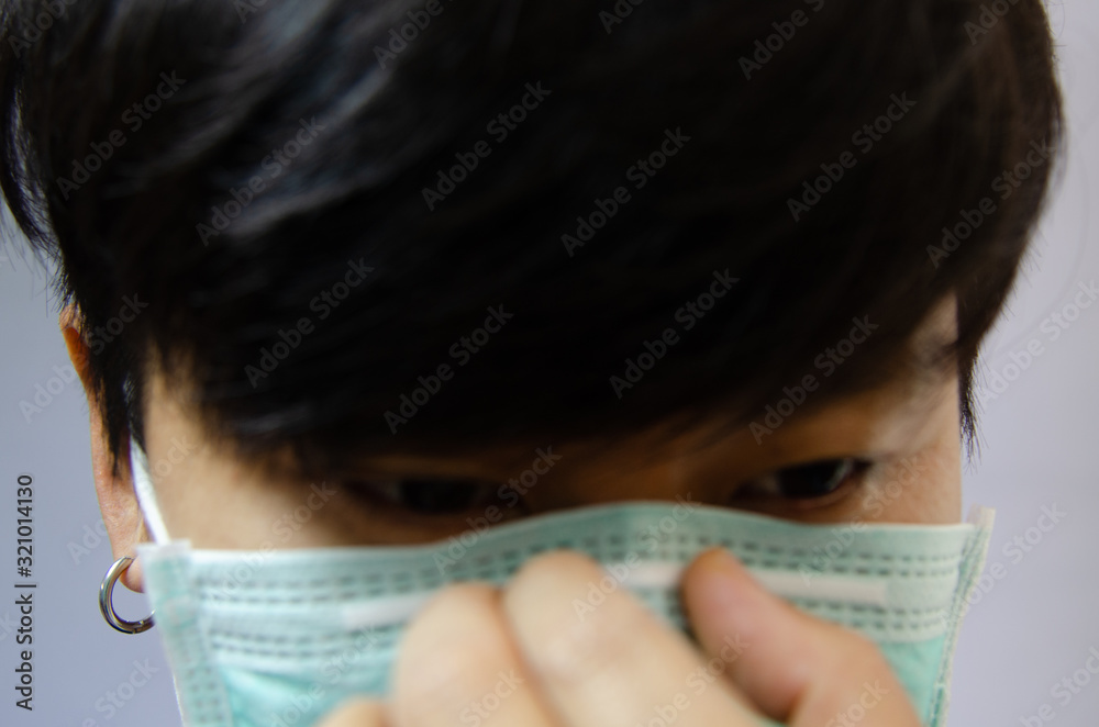 Asia people using surgical mask for protective corona virus. Asia people using surgical mask for protective corona virus.