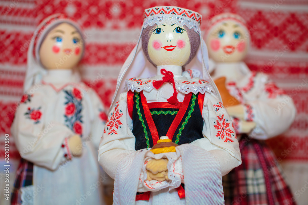 Slavic national dolls. Belorussian Ukrainian Russian ethnic dolls. Lyalka in an embroidered shirt with bread and salt.
