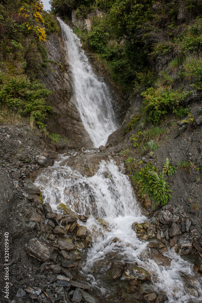 Waterfall at Mount Aspiring National Park. Haast highway 6. Westcoast New Zealand. Waterfall at Mount Aspiring National Park. Haast highway 6. Westcoast New Zealand.