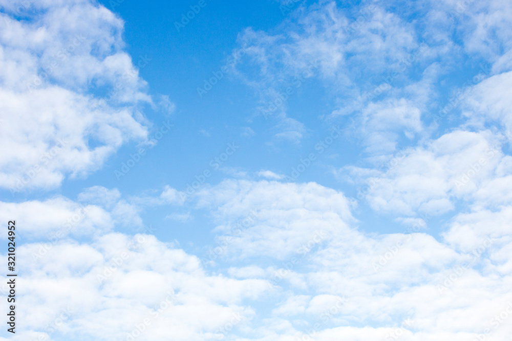 Obraz premium Bright blue sky with white clouds for background or wallpapers