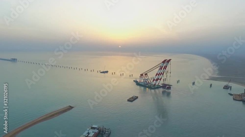 Aerial view of the city of Kuwait. Sheikh Jaber Al Ahmad Bridge Kuwait. (under construction 2017) photo