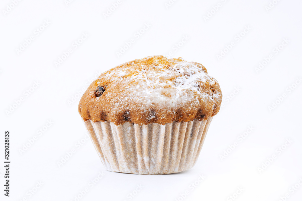 Cupcake with raisins with icing on a white background Cupcake with raisins with icing on a white background