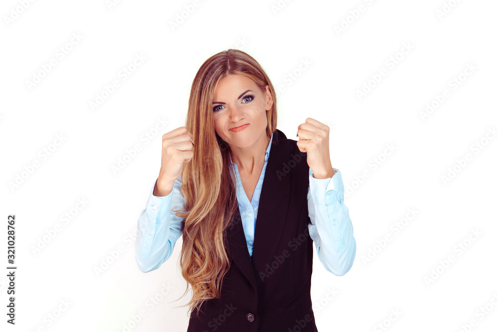 Angry woman is screaming with her fists clenched. She is in despair. Concept of strong emotions. isolated light grey, white background with copy space. Angry woman is screaming with her fists clenched. She is in despair. Concept of strong emotions. isolated light grey, white background with copy space.