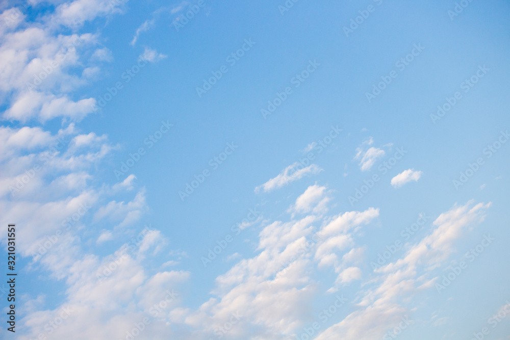 Bright blue sky with white clouds for background or wallpapers