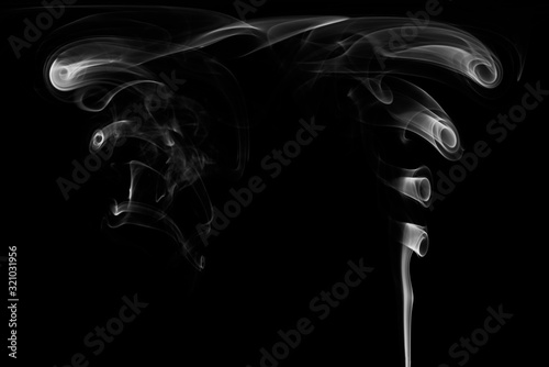 Fototapeta Naklejka Na Ścianę i Meble -  White smoke isolated on black background