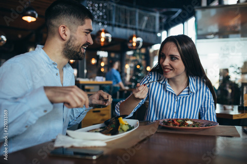 couple having lunch in restaurant