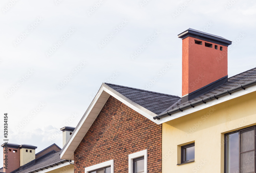 House with a flexible tile roof. House with a flexible tile roof.