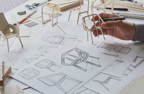 Foto Designer sketching drawing design development product plan draft chair armchair Wingback Interior furniture prototype manufacturing production