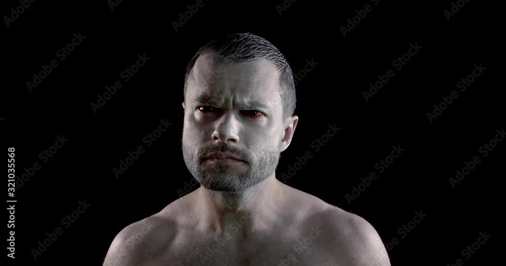 portrait of a dark-haired man, he is in the Studio on a black background. He has a naked torso, is very pale in color, and has red eyes like a vampire. He makes a frown, then smiles with yellow teeth. portrait of a dark-haired man, he is in the Studio on a black background. He has a naked torso, is very pale in color, and has red eyes like a vampire. He makes a frown, then smiles with yellow teeth.