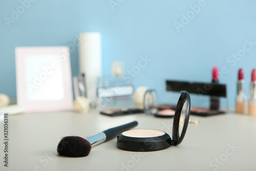 decorative cosmetics for makeup on a dressing table close-up. Place to insert text.