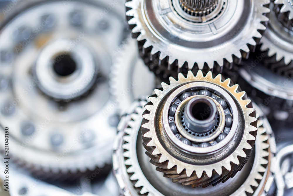 Close-up helical gears in car automatic transmission Close-up helical gears in car automatic transmission