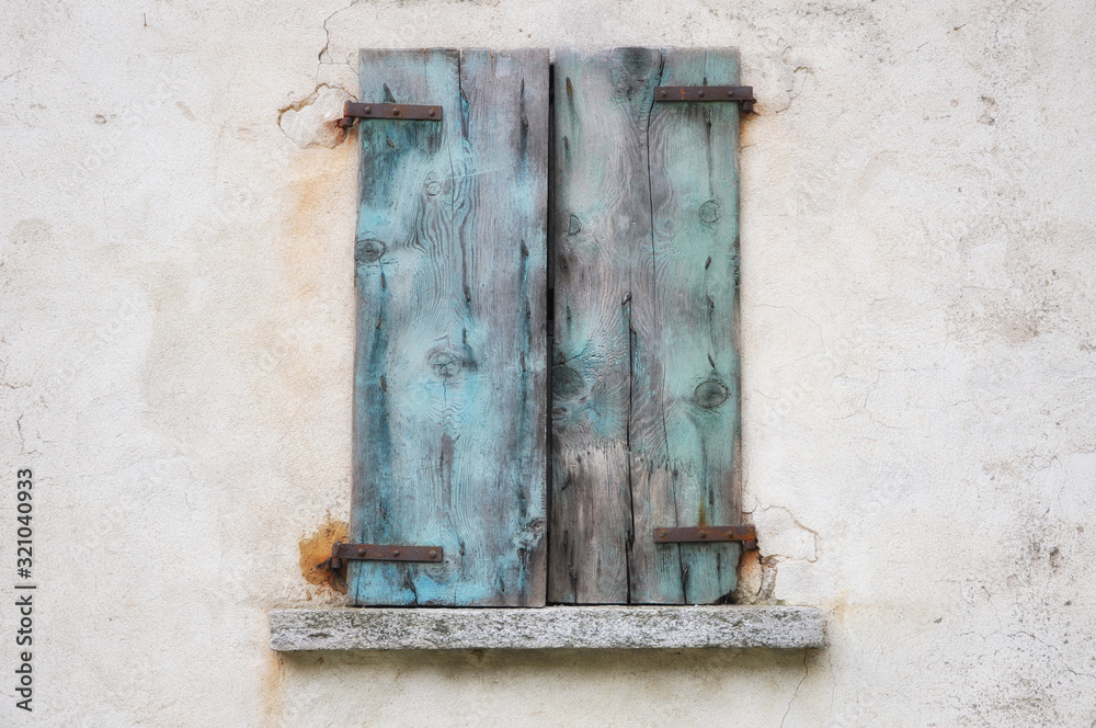 Old Window with Blue Shutter Made in Wood.