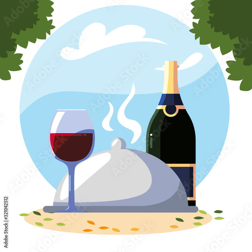bottle and glass of wine with background landscape