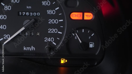 Car dashboard warning lights on old car