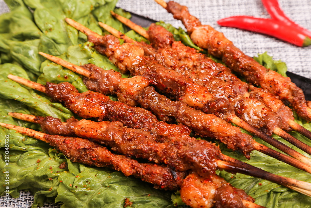 This is a high-end barbecue in Asia. It's made of alligator meat and beef This is a high-end barbecue in Asia. It's made of alligator meat and beef