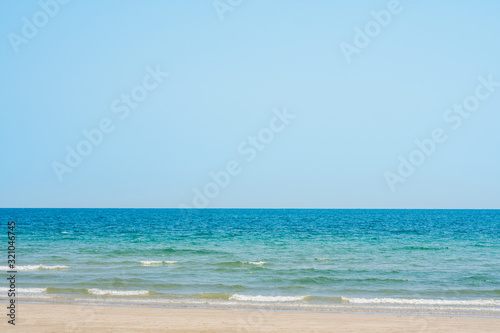 Sand beach and wave background © songdech17