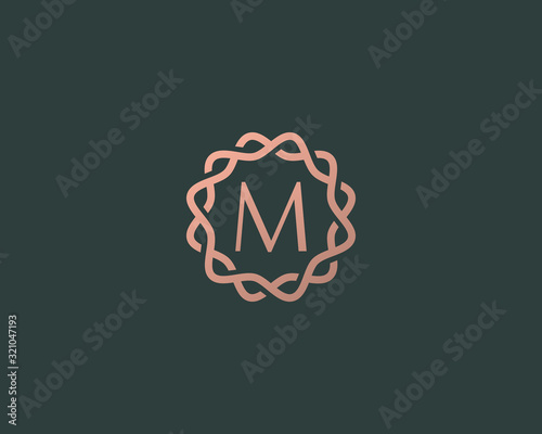 Abstract linear monogram letter M logo icon design modern minimal style illustration. Premium alphabet round wreath frame vector line emblem sign symbol mark logotype