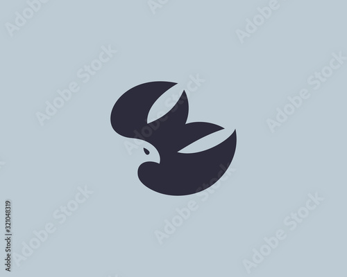 Abstract bird negative space premium logo icon design modern minimal style illustration. Eagle falcon hawk vector emblem sign symbol mark logotype