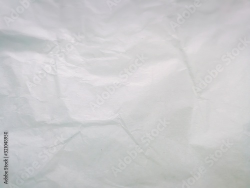 Top view, full frame shot of white crumpled paper background.