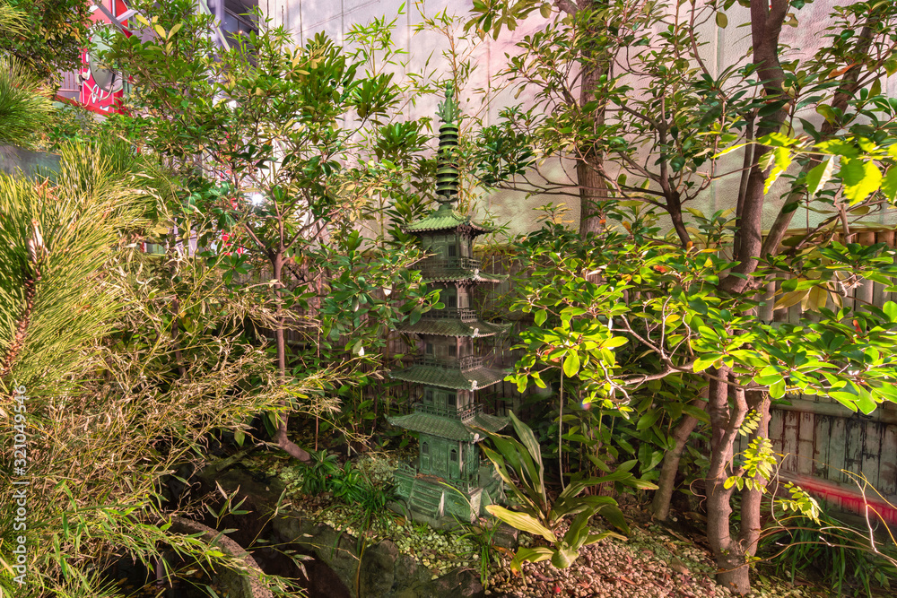 Bronze replica of a five storied pagoda.