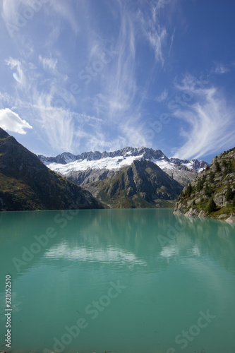 lake at the Goescheneralp (Goescheneralpsee) on a sunny day