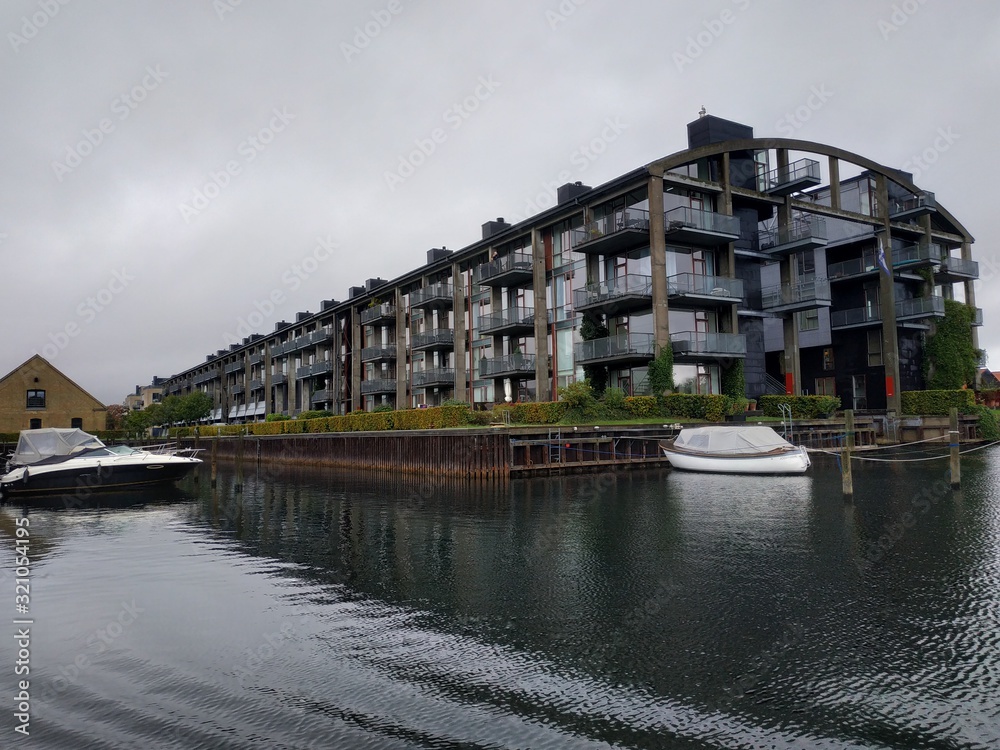 Fototapeta premium Copenhagen, Denmark casual view on the buildings and architecture from canal boat