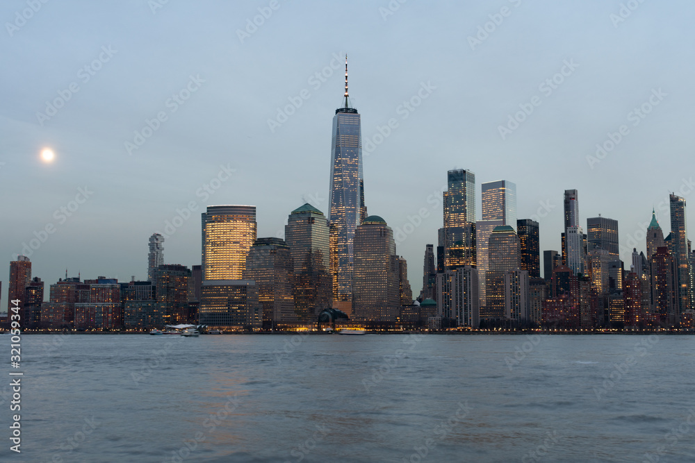 Obraz premium Early Evening Lower Manhattan New York City Skyline at Night with the Moon