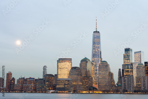Early Evening Lower Manhattan New York City Skyline at Night with the Moon