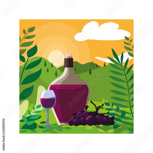 bottle and glass of wine with grapes