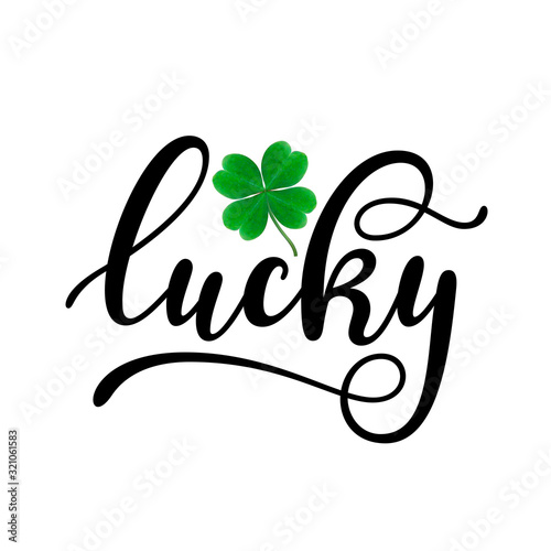 Lucky - black handwritten lettering with four-leaf shamrock isolated on white background. 17 March St. Patrick's, Valentine's Day artwork. Good for greeting cards, t-shirt, and mug design.