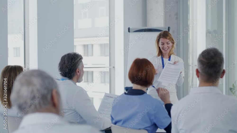 Group of doctors talking about corona virus on conference. Group of doctors talking about corona virus on conference.