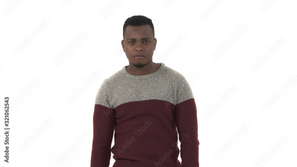 Close-up portrait of young man demonstrating the emotion as if he doesn't need her love, isolated white background. Break up concept. Isolated, on white background Close-up portrait of young man demonstrating the emotion as if he doesn't need her love, isolated white background. Break up concept. Isolated, on white background