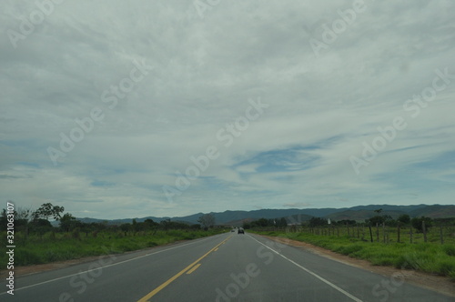 road view car in cloud day background