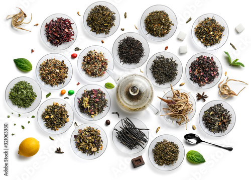 Large assortment of tea on a white background. The view from the top