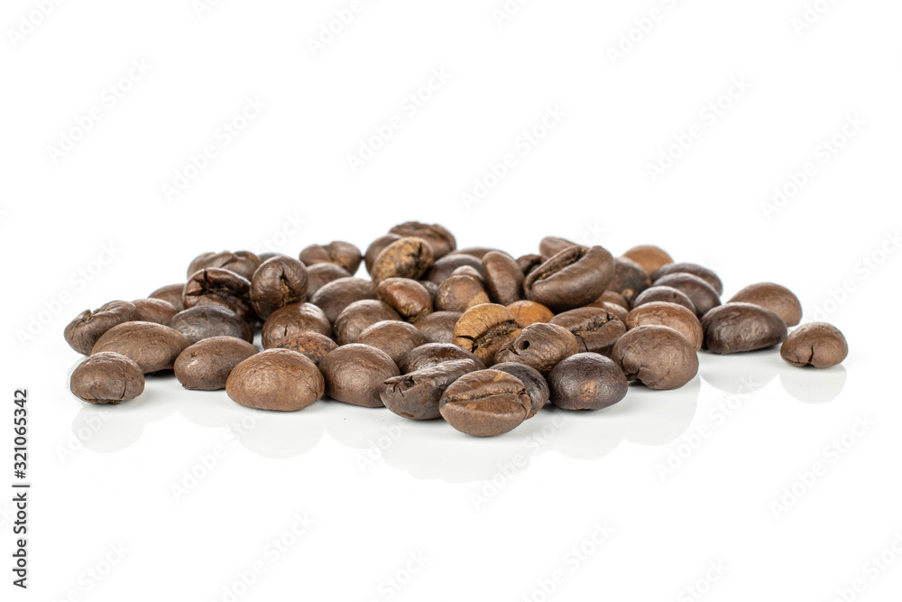 Lot of whole roasted fresh coffee bean isolated on white background Lot of whole roasted fresh coffee bean isolated on white background