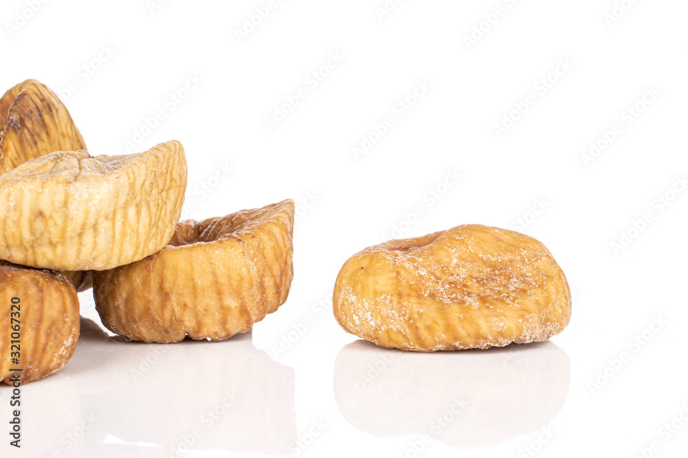 Group of four whole dried fig isolated on white background Group of four whole dried fig isolated on white background