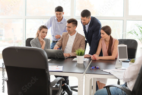 Group of business people during meeting in office