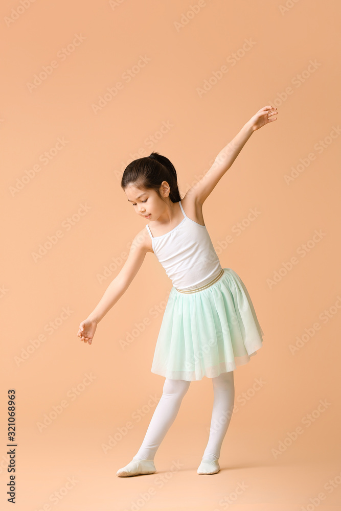 Cute little ballerina on color background Cute little ballerina on color background
