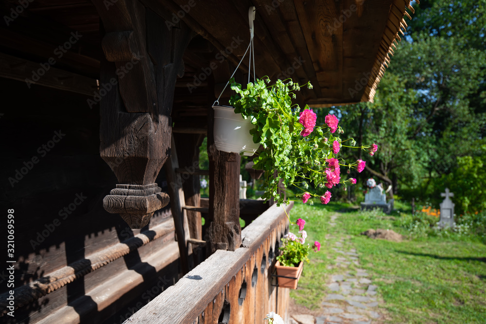 Obraz premium Porch of traditional Maramures wooden church. UNESCO world heritage site. Surdesti, Maramures, Romania