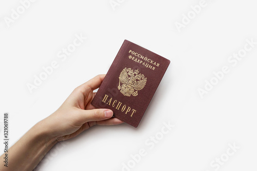 passport in hand on a white background. passport of the Russian Federation on a white background. passport in hand on any background. a banner with the passport