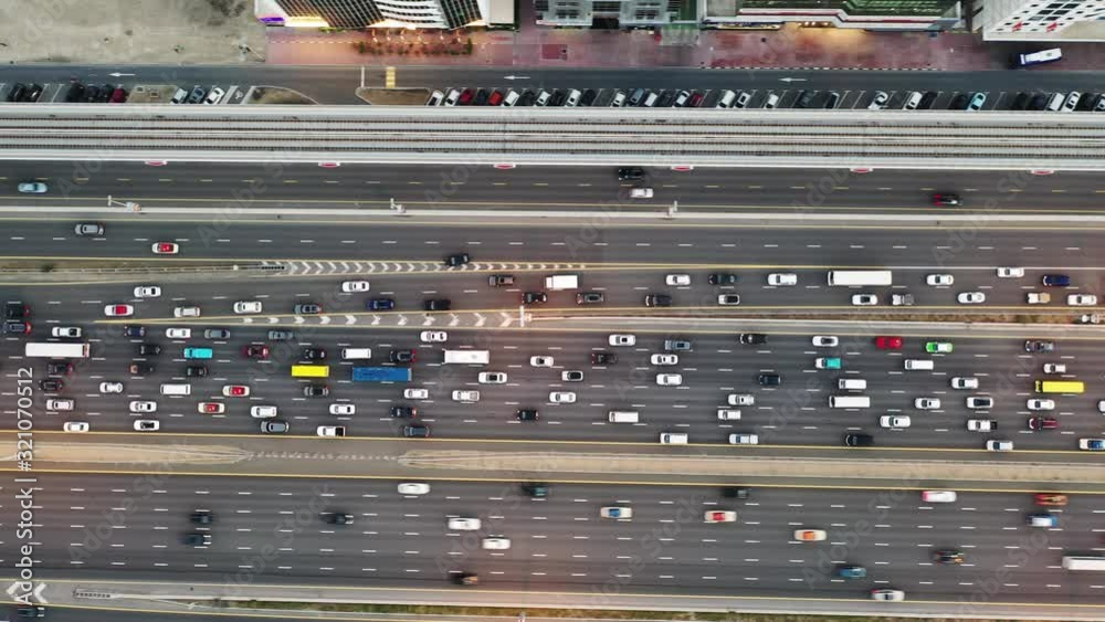 aerial top view of busy traffic on dubai highway urban and modern transportration concept aerial top view of busy traffic on dubai highway urban and modern transportration concept