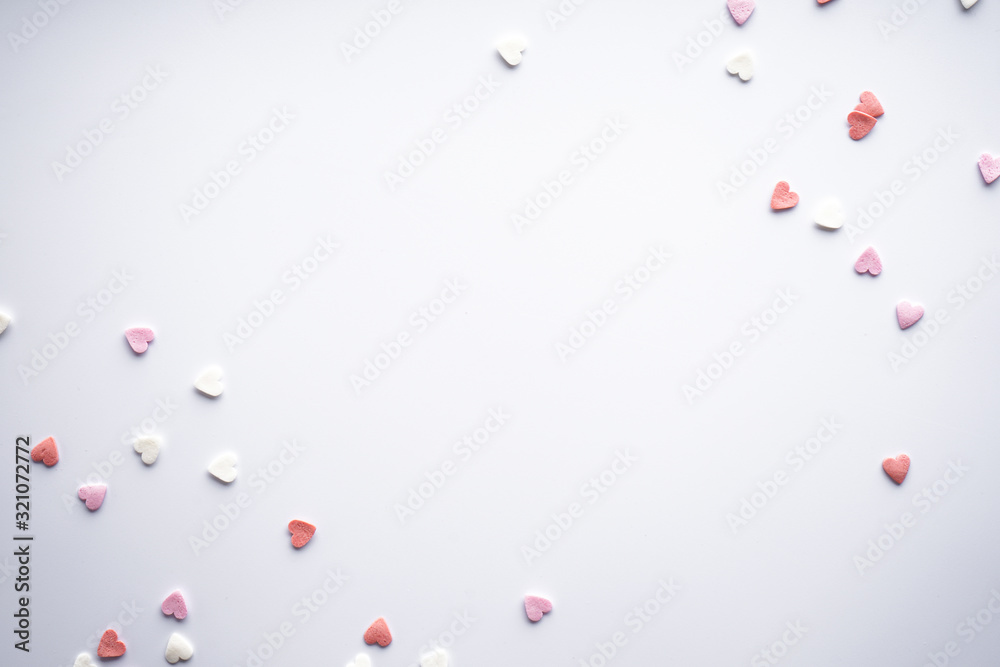 Sweet hearts on a white background, with space for text, flat lay. Valentine's Day. Love concept.