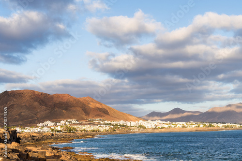 Playa Blanca at golden hour in Lanzarote Island. Canary, Spain.