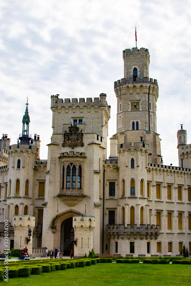 Vertical picture of the facade of Hluboka Castle (Hluboka nad Vltavou Castle), also called The State Chateau of Hluboka, one of the most famous landmarks in Czech Republic