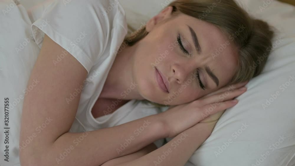 Portrait of Young Woman Trying to Sleep in Bed Portrait of Young Woman Trying to Sleep in Bed