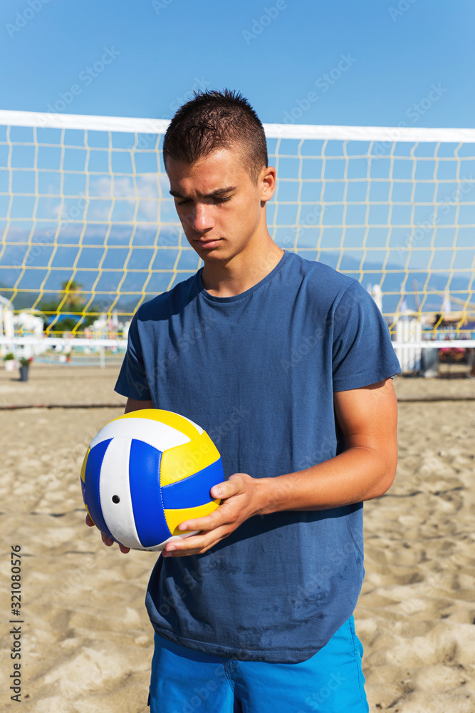 Playing Volleyball On The Beach