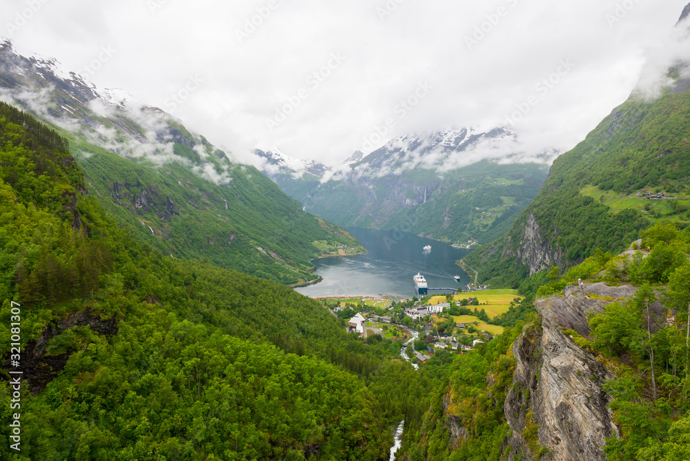 Geiranger / Norway 06.29.2015Panoramic view of Geiranger Fjord on cloudy day