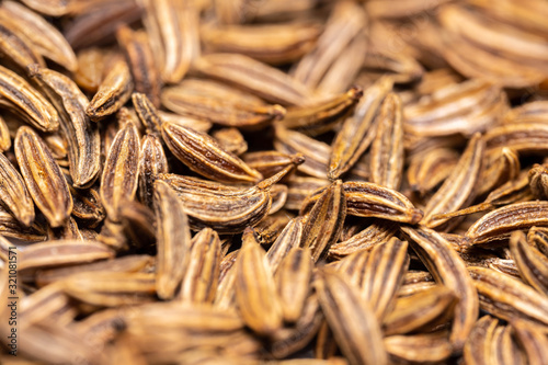 Background texture of caraway seeds.