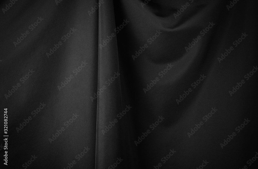 Black luxury fabric background, drapery texture