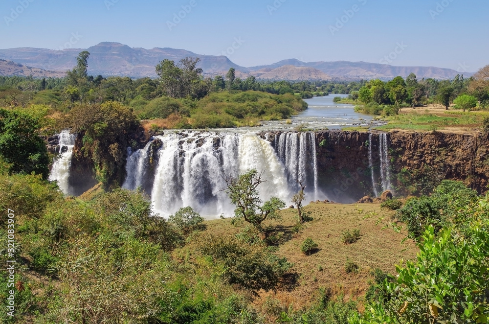 Beautiful view of Blue Nile Falls. Waterfall on the Blue Nile river. Nature and travel. Ethiopia, Amhara Region, near Bahir Dar and Lake Tana